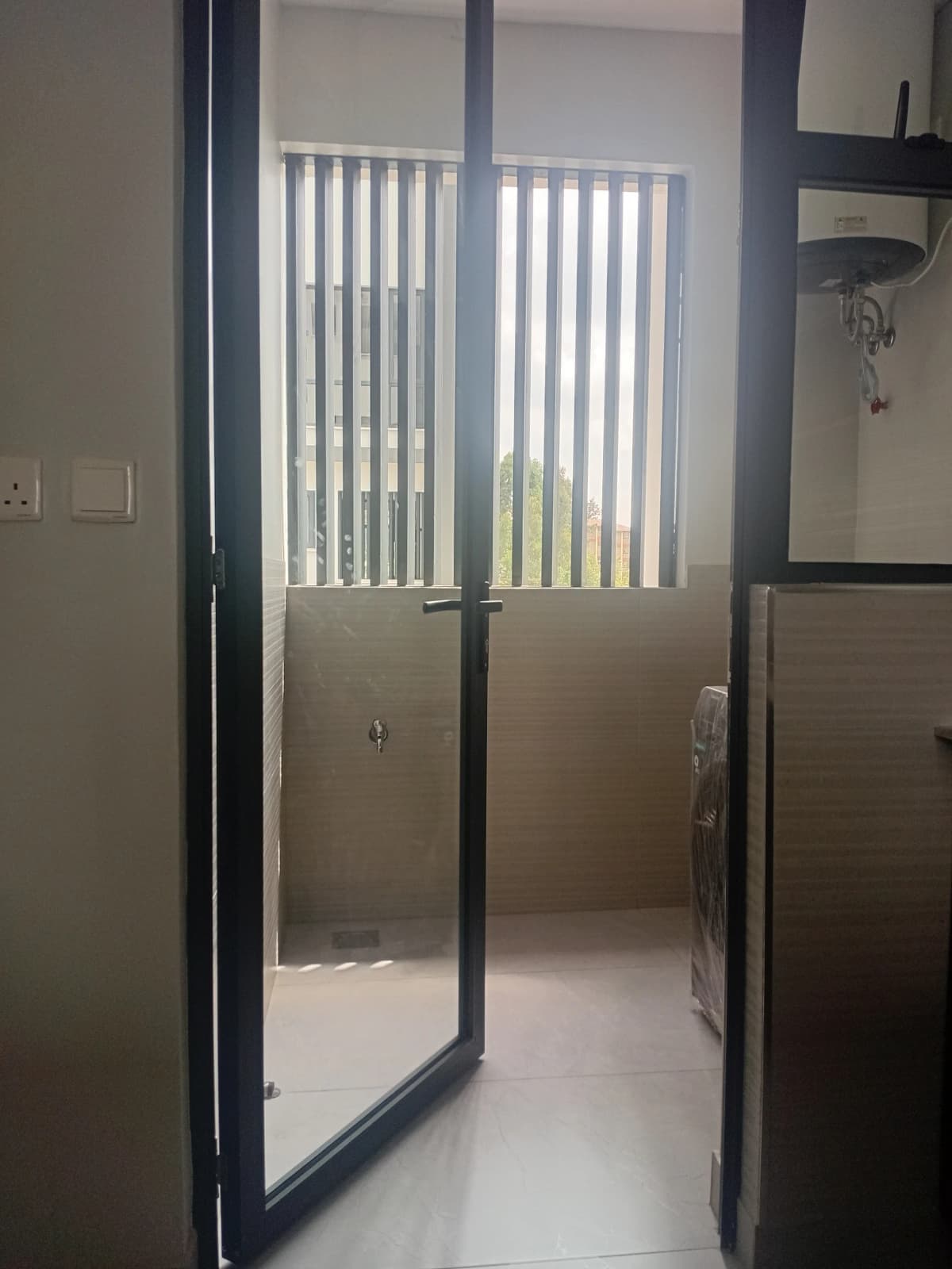 Balcony with vertical blinds and glass sliding doors