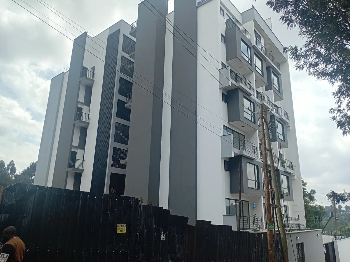 Modern multi-story residential building facade with balconies