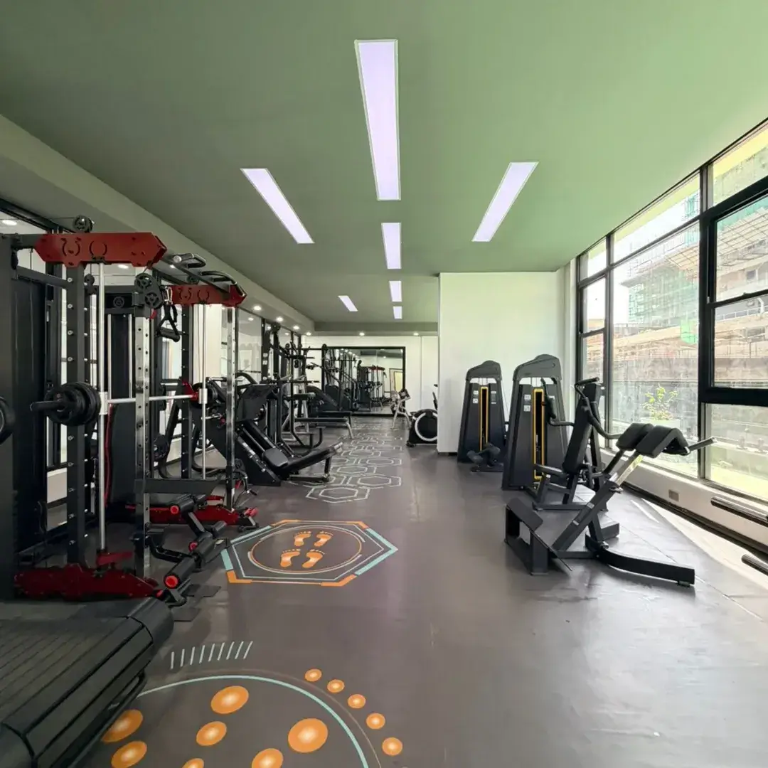 Modern fitness facility with multiple cardio and strength machines