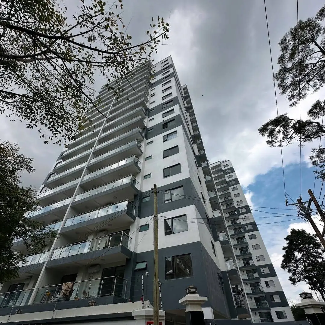 Modern multi-story residential building facade with balconies