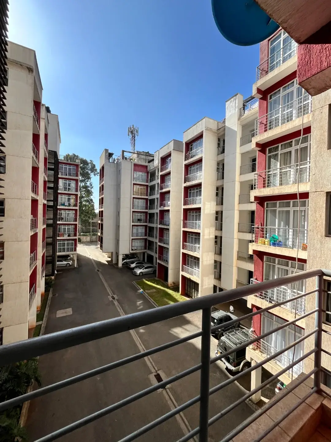 Residential apartment complex with landscaped grounds and pathways