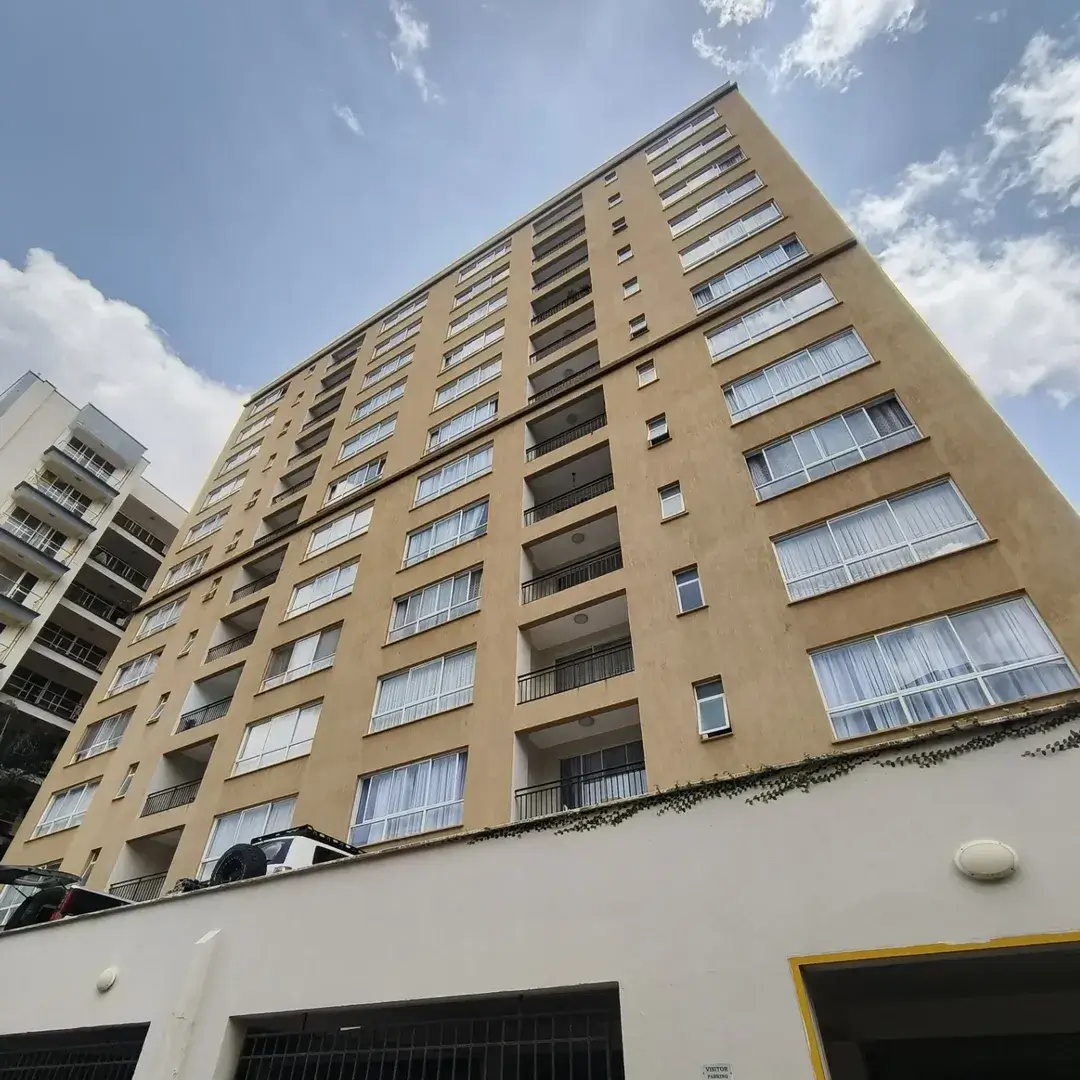 Multi-story residential building facade with balconies